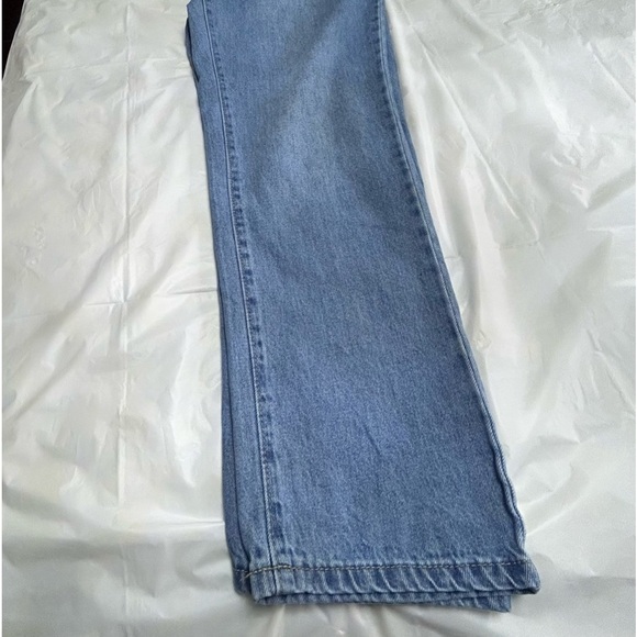 Forever21 denim blue jeans with grommets and chains on each side. - Picture 5 of 6